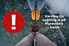 Fötter på is med en varning